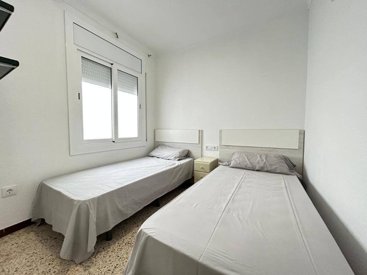Apartamentos playa la Perola Roses Bagian luar foto