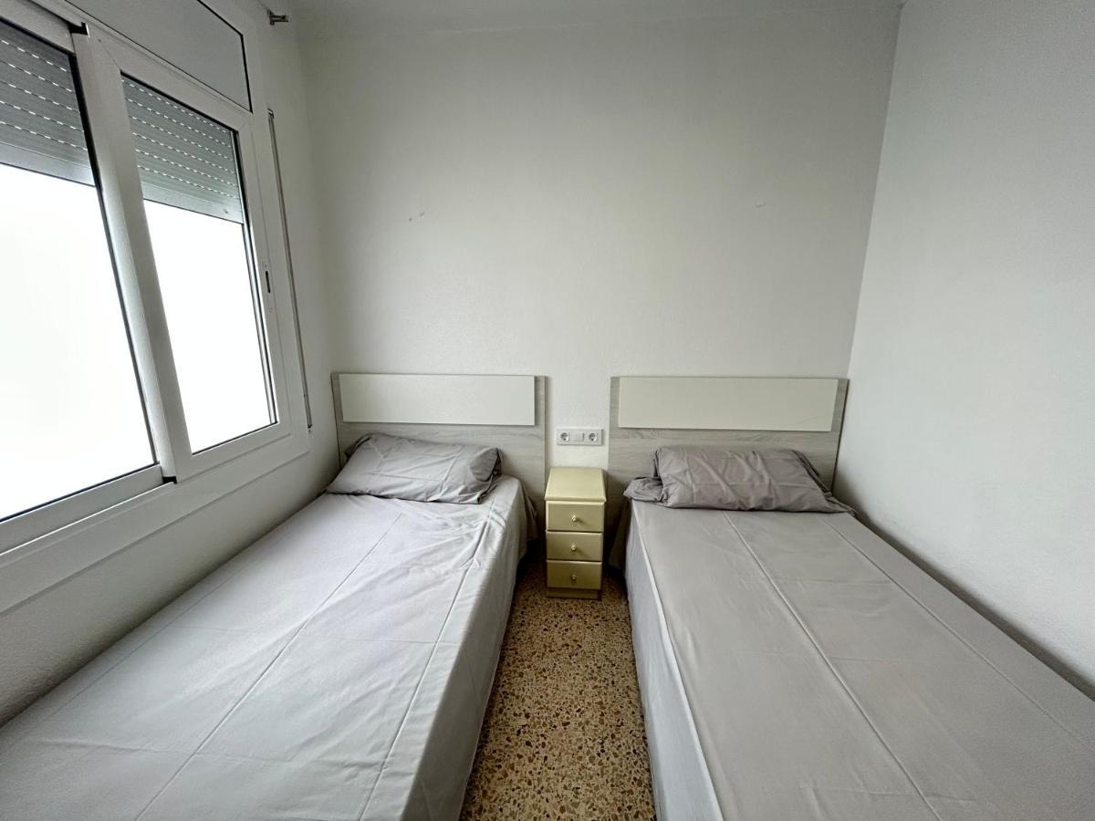 Apartamentos playa la Perola Roses Bagian luar foto